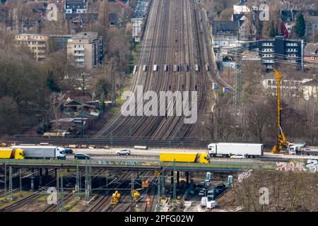 Duisburg, Germany. 17th Mar, 2023. The 8-lane rail line at the Kaiserberg interchange (aerial photo taken with a drone). The railroad will completely close the heavily used line between Essen and Duisburg for two weeks from 9 p.m. on March 31 to April 14 during the Easter vacations. At a total cost of nine million euros, tracks in Duisburg, Oberhausen and Essen would be renewed over a distance of seven kilometers, points replaced and the power supply for the trains modernized. Credit: Christoph Reichwein/dpa/Alamy Live News Stock Photo