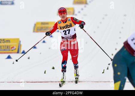 Heidi Weng, of Norway, crosses the finish line to win the silver medal ...