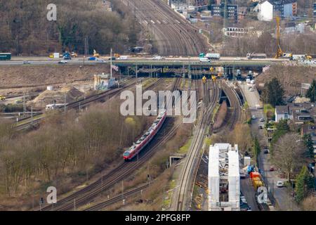 Duisburg, Germany. 17th Mar, 2023. The 8-lane rail line at the Kaiserberg interchange (aerial photo taken with a drone). The railroad will completely close the heavily used line between Essen and Duisburg for two weeks from 9 p.m. on March 31 to April 14 during the Easter vacations. At a total cost of nine million euros, tracks in Duisburg, Oberhausen and Essen would be renewed over a distance of seven kilometers, points replaced and the power supply for the trains modernized. Credit: Christoph Reichwein/dpa/Alamy Live News Stock Photo