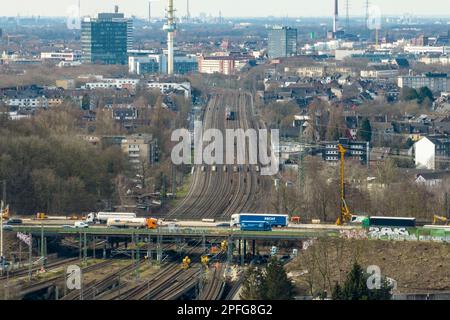 Duisburg, Germany. 17th Mar, 2023. The 8-lane rail line at the Kaiserberg interchange (aerial photo taken with a drone). The railroad will completely close the heavily used line between Essen and Duisburg for two weeks from 9 p.m. on March 31 to April 14 during the Easter vacations. At a total cost of nine million euros, tracks in Duisburg, Oberhausen and Essen would be renewed over a distance of seven kilometers, points replaced and the power supply for the trains modernized. Credit: Christoph Reichwein/dpa/Alamy Live News Stock Photo