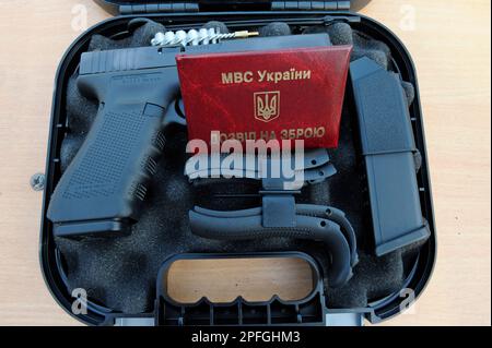 Fire-Arm Glock placed on a box. It was awarded soldiers of KORD (police special forces, Ukrainian SWAT). September 5,2018. Kiev, Ukraine Stock Photo