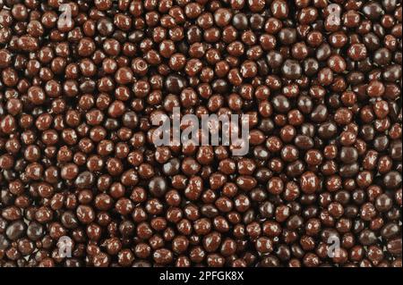 chocolate beans in the store. macro. full frame Stock Photo