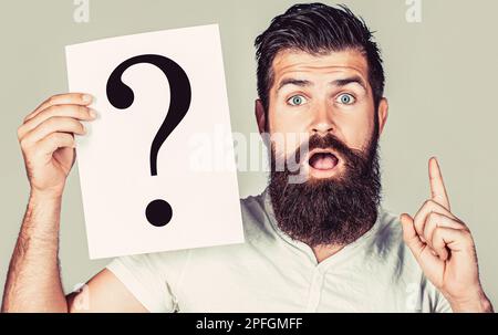 Man Question, emotion. Man question. Male with question marks. Getting answers Stock Photo