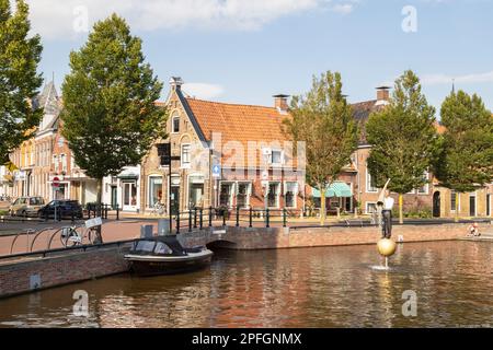 Fountain - The man with the cornucopia, in the Dutch town of Sneek in Friesland. Stock Photo