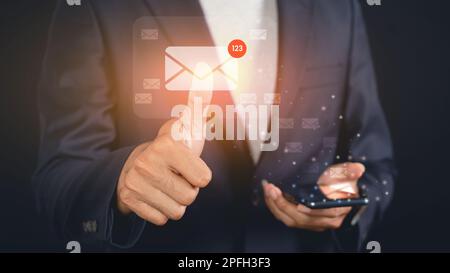 Business man touching email on virtual screen. electronic message. Email notification concept Stock Photo