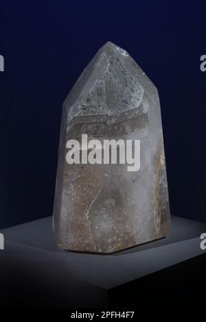 Smoky crystal quartz on stand. Various layer of colour. Rare crysta. Stock Photo