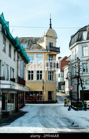 Stavanger, Norway, March 10 2023, Old Town Stavanger Traditional Building Architecture With Lying Snow In Winter Stock Photo