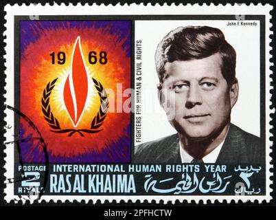RAS AL-KHAIMAH - CIRCA 1968: a stamp printed in Ras al-Khaimah shows John F. Kennedy (1917-1963), was an American politician who served as the 35th pr Stock Photo