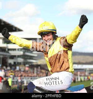 Jockey Paul Townend celebrates as Galopin Des Champs J: Paul Townend T: Willie Mullins wins the Cheltenham Gold Cup during Day 4 of the Cheltenham Festival at Prestbury Park, Cheltenham, UK on 14 March 2023. Photo by Ken Sparks. Editorial use only, license required for commercial use. No use in betting, games or a single club/league/player publications. Credit: UK Sports Pics Ltd/Alamy Live News Stock Photo