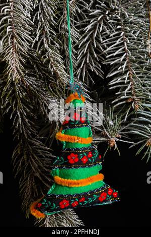 handmade Christmas tree toy, Christmas toy herringbone tree, burlap. Stock Photo