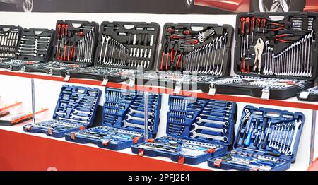 Set socket wrenches in plastic box at store Stock Photo