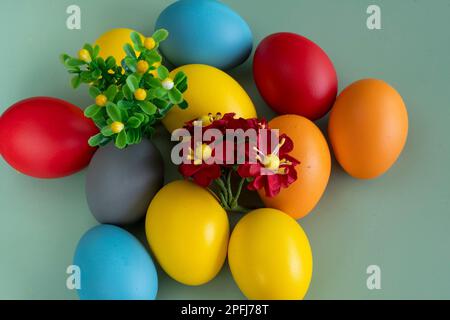 colorful eggs symbolize easter. Easter minimal concept. Creative Happy Easter, spring layout. Stock Photo