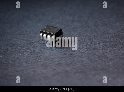 8 pins semiconductor chip. Close up of a IC chip. Stock Photo