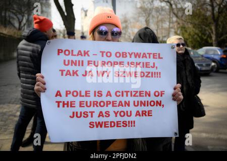 Family and supporters are seen rallying in front of the Swedish embassy in Warsaw, Poland on 17 March, 2023. Mariusz Dworakowski, a 47 year old Polish man arrested in December 2021 by Sweidsh police is currently serving time in jail in Sweden. Family membes say Mariusz was in the wrong place at the wrong time and was forced to remain lying on the street in freezing cold temperatures after suffering physical abuse by police. His family is demanding financial compensation for permanent injuries suffered during the arrest. Swedish authorities deny any wrongdoing by police and say the Mariusz will Stock Photo