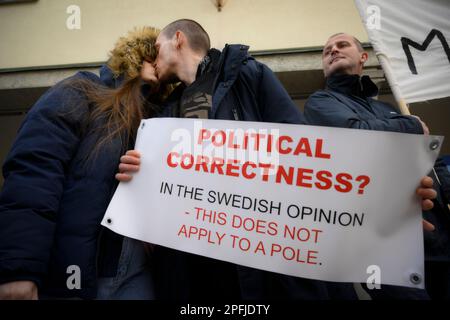 Family and supporters are seen rallying in front of the Swedish embassy in Warsaw, Poland on 17 March, 2023. Mariusz Dworakowski, a 47 year old Polish man arrested in December 2021 by Sweidsh police is currently serving time in jail in Sweden. Family membes say Mariusz was in the wrong place at the wrong time and was forced to remain lying on the street in freezing cold temperatures after suffering physical abuse by police. His family is demanding financial compensation for permanent injuries suffered during the arrest. Swedish authorities deny any wrongdoing by police and say the Mariusz will Stock Photo