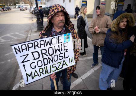 Family and supporters are seen rallying in front of the Swedish embassy in Warsaw, Poland on 17 March, 2023. Mariusz Dworakowski, a 47 year old Polish man arrested in December 2021 by Sweidsh police is currently serving time in jail in Sweden. Family membes say Mariusz was in the wrong place at the wrong time and was forced to remain lying on the street in freezing cold temperatures after suffering physical abuse by police. His family is demanding financial compensation for permanent injuries suffered during the arrest. Swedish authorities deny any wrongdoing by police and say the Mariusz will Stock Photo