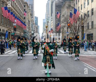 New York, USA. 17th Mar, 2023. A band of bagpipers from the New York State Courts participate in the St. Patrick's Day parade on March 17, 2023 in New York City. About 150,000 people march through Fifth Avenue every year in the largest the St. Patrick's Day Parade, who has been held annually since 1762 to celebrate Irish heritage. Credit: Enrique Shore/Alamy Live News Stock Photo