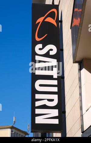 Facade with sign and logo, SATURN, consumer electronics store, Hagen, North Rhine-Westphalia, Germany Stock Photo