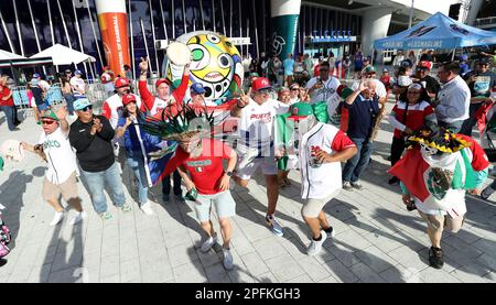 Miami, United States. 17th Mar, 2023. Baseball fans dance outside of LoanDepot Park prior to the start of the 2023 World Baseball Classic quarterfinal game between Mexico and Puerto Rico in Miami, Florida on Friday, March 17, 2023. Photo by Aaron Josefczyk/UPI Credit: UPI/Alamy Live News Stock Photo