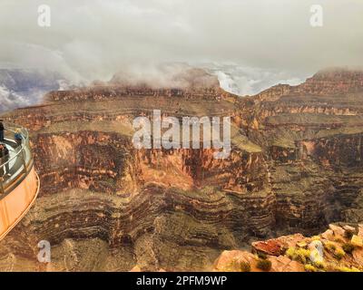 PaWest Rim of the Grand Canyon overlooking the Skywalk on a cloudy foggy day Stock Photo