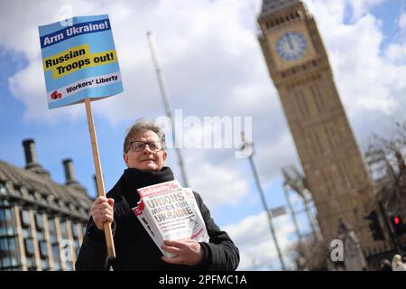 Westminster, London, UK - A protester attends a march organised by British trade unions to denounce Russian invasion of Ukraine on April 9, 2022. Stock Photo