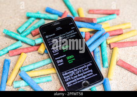 ChatGPT-4 outperforms ChatGPT by scoring in higher approximate percentiles among test takers open in a browser of OpenAI website Stock Photo