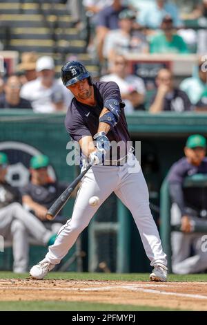 MARCH 16, 2023, Lakeland FL USA; Detroit Tigers infielder Andre Lipscius (27) singles to right field during an MLB spring training game against the Ne Stock Photo
