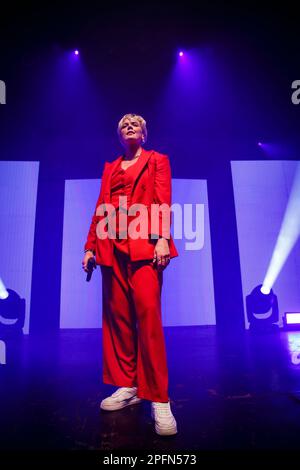 Toronto, Canada. 17th Mar, 2023. Australian-American singer Betty Who performs on stage in a red suit holding a microphone Credit: Bobby Singh/Alamy Live News Stock Photo