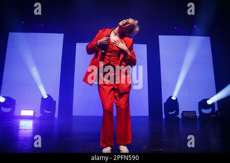 Toronto, Canada. 17th Mar, 2023. Australian-American singer Betty Who performs on stage in a red suit holding a microphone Credit: Bobby Singh/Alamy Live News Stock Photo