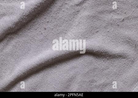 light gray cotton crumpled fabric as background close-up, fabric for background Stock Photo