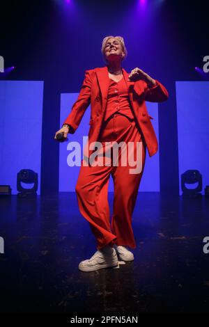 Toronto, Canada. 17th Mar, 2023. Australian-American singer Betty Who performs on stage in a red suit holding a microphone Credit: Bobby Singh/Alamy Live News Stock Photo