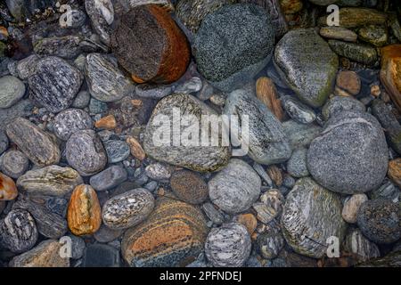 full screen of beautiful stones in river Stock Photo