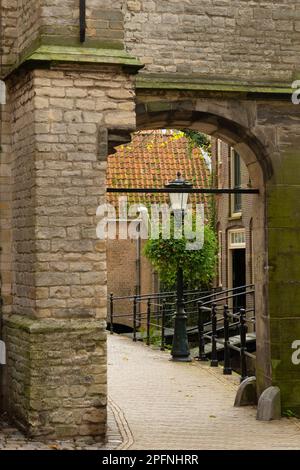 Narrow alley in the center of the medieval city of Gouda Stock Photo