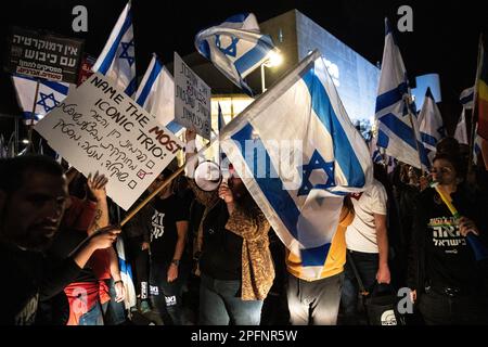 Israel. 16th Mar, 2023. Israeli protestors wave the Israeli flag and hold a signs during a protest in Tel Aviv. Israeli protestors against the legal overhaul rallied around the country to distrurb the public order for the third time. Mar 16th 2023. (Photo by Matan Golan/Sipa USA). Credit: Sipa USA/Alamy Live News Stock Photo