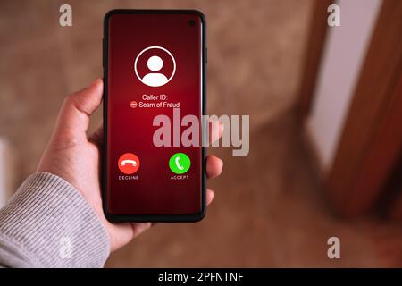 Smartphone incoming unwanted call. Spam, scam, phishing and fraud concept. Security technology. Stock Photo