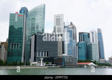 Marina Bay, Singapore - February 19, 2023 - The view of the tall and modern buildings by the bay Stock Photo