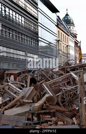 Berlin, Germany. 18th Mar, 2023. View of the installation of a barricade on the corner of Jägerstraße and Friedrichstraße during the Berlin Weekend for Democracy on the 175th anniversary of the March Revolution of 1848. This is the spot where the barricade fights broke out on March 18, 1848. Credit: Carsten Koall/dpa/Alamy Live News Stock Photo