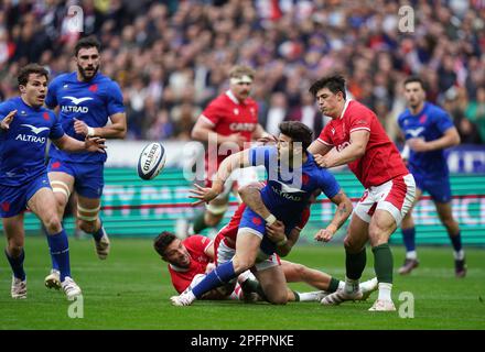 France's Romain Ntamack offloads the ball during the Guinness Men's Six ...