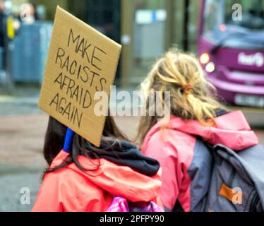 Glasgow, Scotland, UK 18th March, 2023. Central bank digital currency (CBDC) protest on the democracy spot of Glasgow,  anti racism demonstrators with make racists afraid banner . Credit Gerard Ferry/Alamy Live News Stock Photo