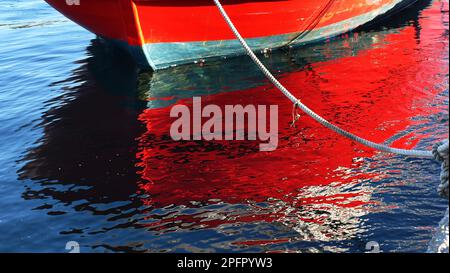boatreflection on harbor Stock Photo