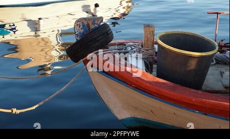 boatreflection on harbor Stock Photo