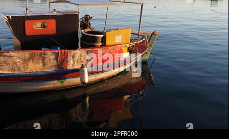 boatreflection on harbor Stock Photo