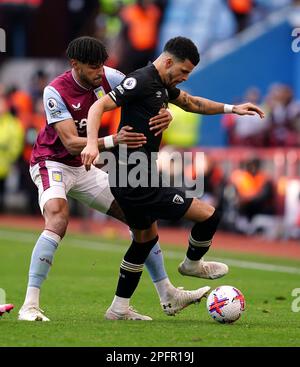 Dominic Solanke of Bournemouth holds off Dara O'Shea of Burnley and ...