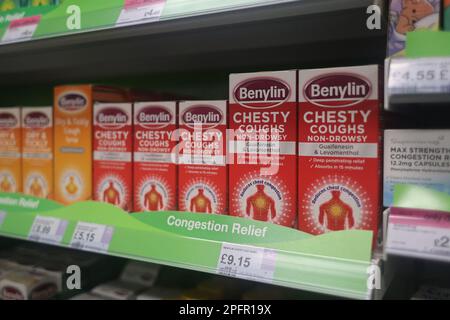 Benylin chesty cough syrup on display in a UK pharmacy Stock Photo