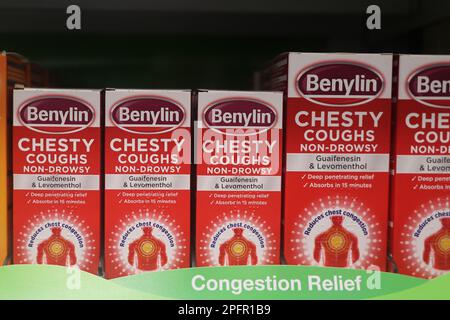 Benylin chesty cough syrup on display in a UK pharmacy Stock Photo