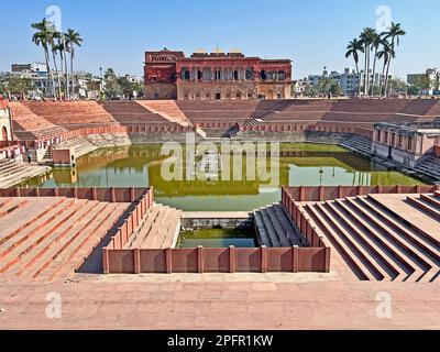 Hussianabad Pond situated next to chota Imambara with stone steps and picture gallery in the far end in Kucjnow city in Uttar Pradesh in India Stock Photo