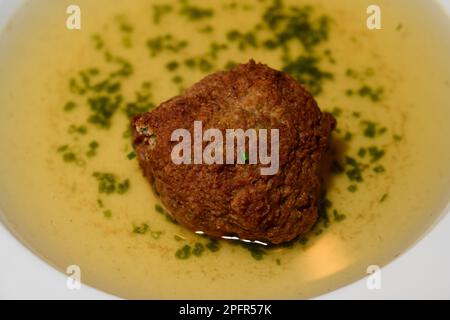 Liver Dumpling Soup or Leberknoedelsuppe, Austrian Beef Broth Stock Photo