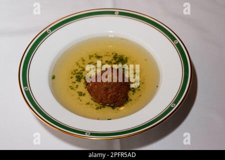 Liver Dumpling Soup or Leberknoedelsuppe, Austrian Beef Broth Stock Photo
