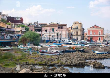 At Aci TRezza, Italy, On 08-08-22, The little harbor and distinctive lavic rock formation called islands of cyclops Stock Photo