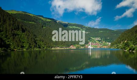 Turkey's famous tourist mountain lake. Long lake (Uzungöl) view from the top of the view in the morning light. Trabzon,Turkey Stock Photo